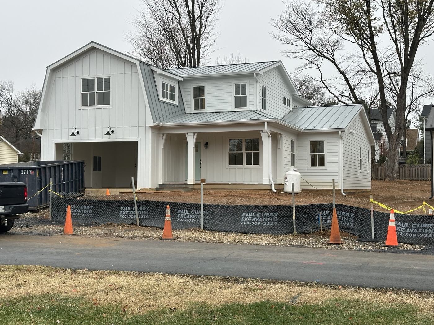light gray standing seam metal roof ridge cap and roof panels